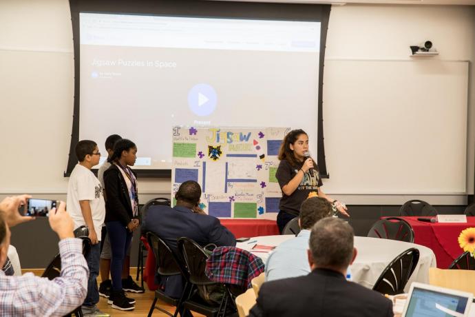 Middle schoolers participating in the Bernard Harris Summer STEM Camp gave a presentation about jigsaw puzzles in space to STEM forum attendees.