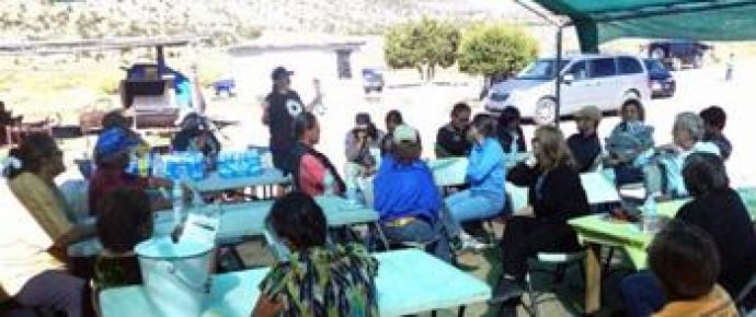 A community meeting near a uranium mine