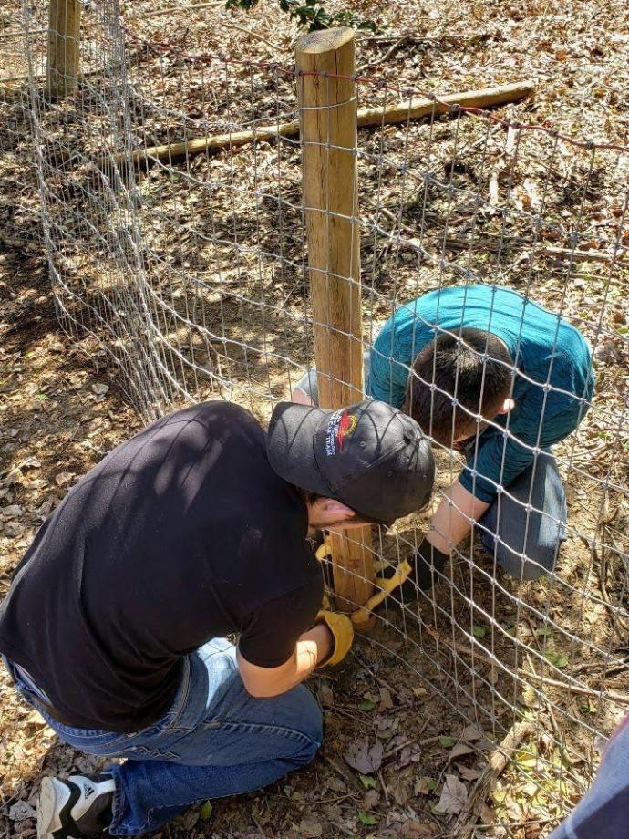 (Top and bottom) NJIT students helped install livestock fencing at OASIS tlc, which operates a farm for young adults with autism to learn animal care, horticulture and other vocations.