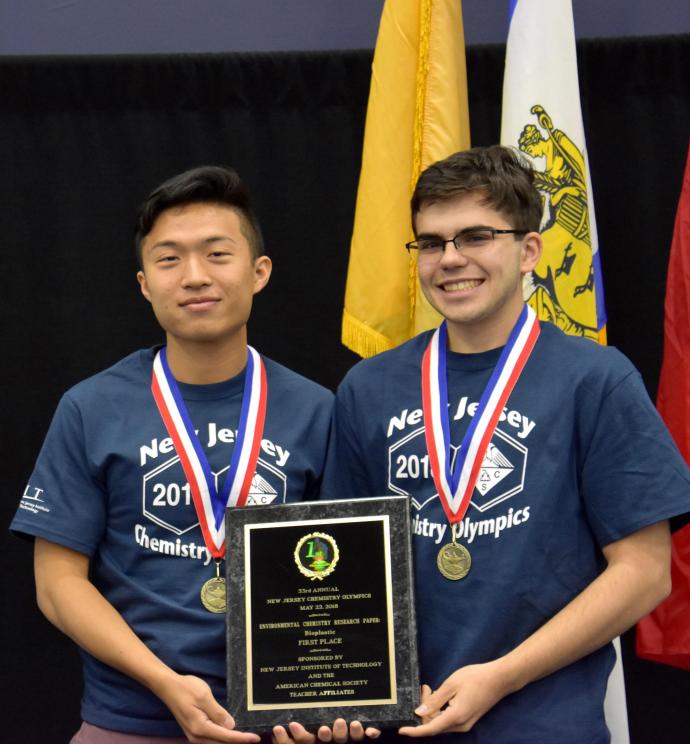 Gold medalists, Shan Jiang (left) and Edward Neves, help John P. Stevens High School win top Olympic honors.