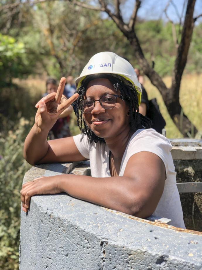 Ebony Payne ’22 prepares to climb out of the 2,000-year-old aqueduct.