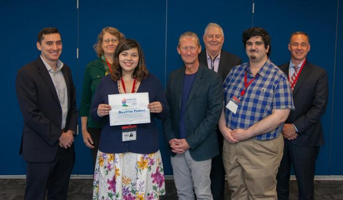 Kaila Trawitzki (third from left) and Mert Nacir (sixth from left) placed second in Horizon BCBSNJ’s Health Care Transformation Challenge. With them are judges (from left) Craig Limoli, Kathleen O’Brien, Douglas Blackwell, Allen Karp and Chad Forbes. 