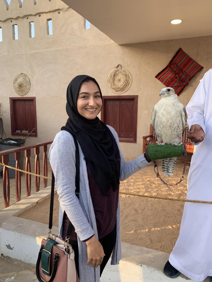 At the Sheikh Zayed Festival with a falcon, the UAE national bird