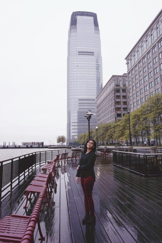 With the Goldman Sachs tower in the distance, Priya Ravi was all smiles in the neighborhood where she'll officially begin her career.