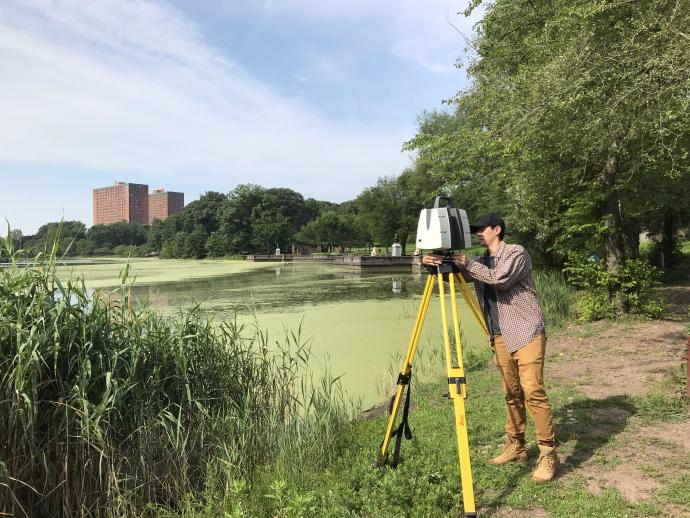 Performing a 360-degree scan of the lake using the laser scan system.