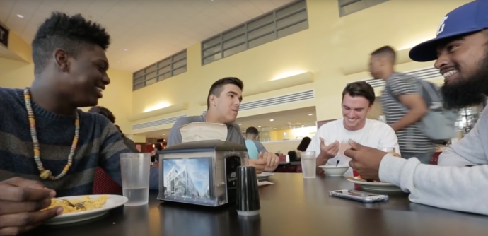 A groups of students enjoy breakfast inside the Continuous Dining Hall. 