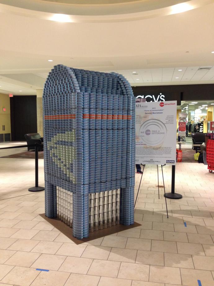 The structure stands 72 tuna cans high (7 foot 6 inches) and 3 feet wide by 3.5 feet deep.