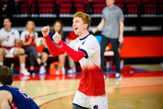 He competed as a libero and outside hitter and made all-academic teams.