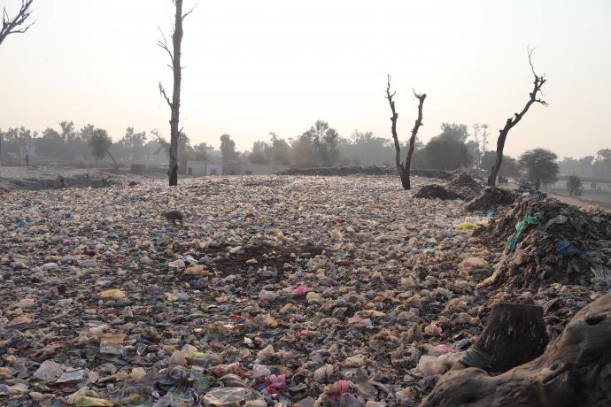 A huge garbage dumping point near a canal. Photo credit Muhammad Numan on Unsplash