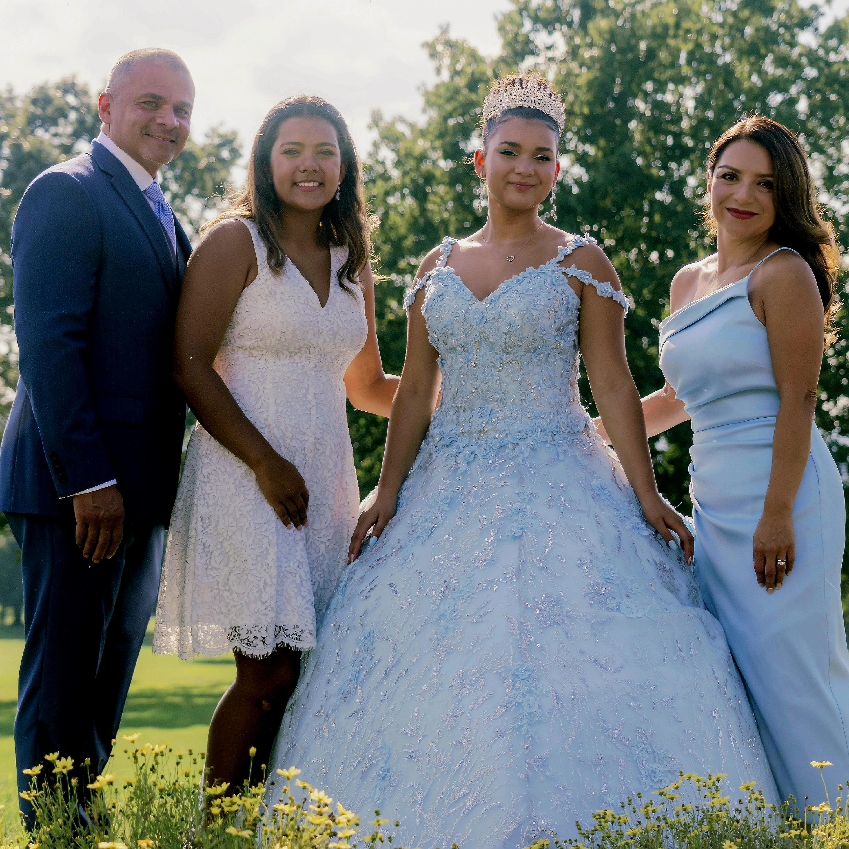 Nefferty Santiago with her family, celebrating her youngest daughter’s quinceañera.