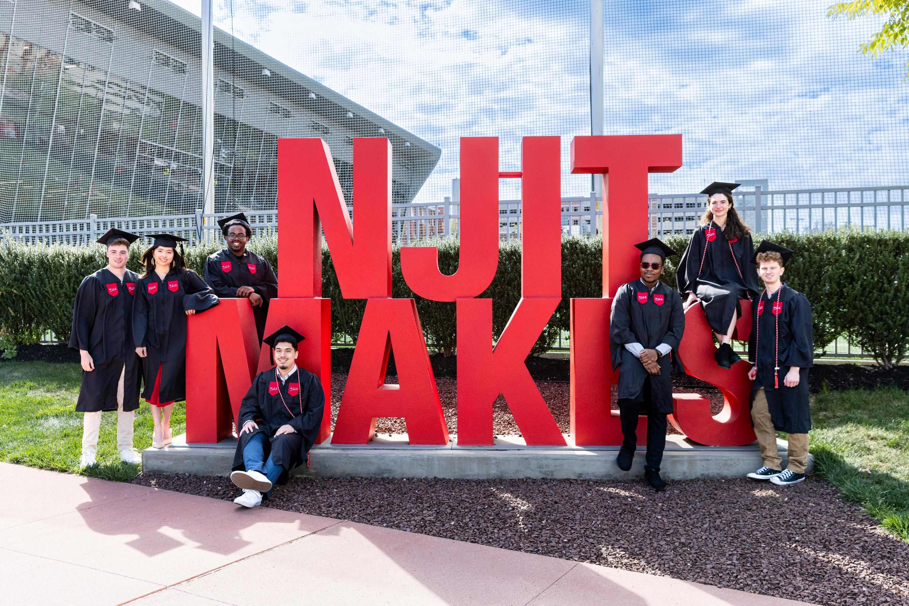 Students with NJIT Makes sign