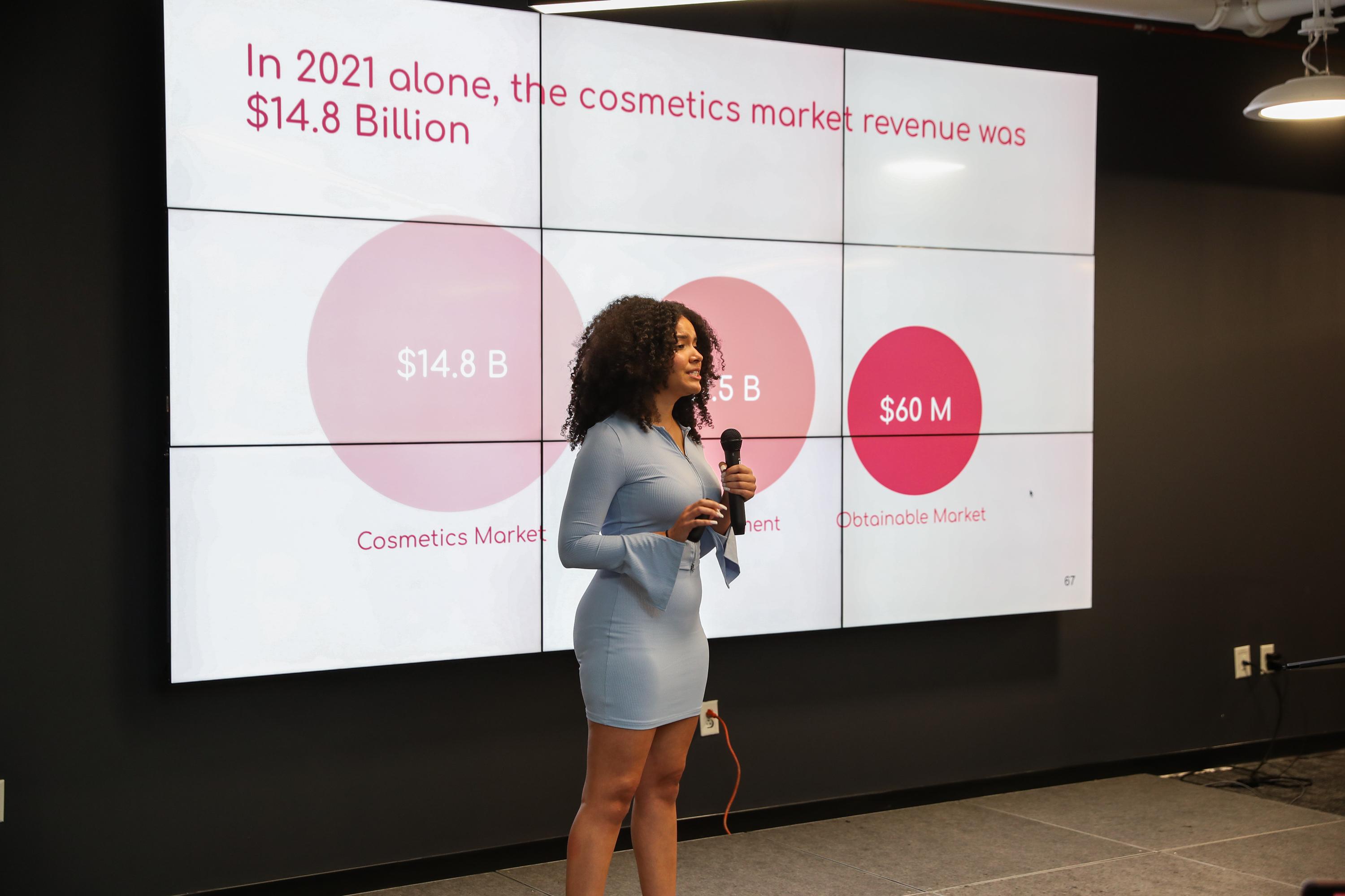 Johmary Adames introduces her startup called DualTips.