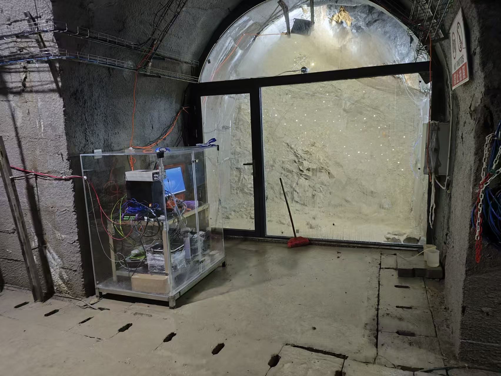 A monitoring site for radon emissions and hillslope deformation inside a tunnel in the Three Gorges Reservoir Region. This world-class geohazard observation platform was excavated directly inside a landslide to enable in-situ scientific investigation by researchers at the China University of Geosciences. Photo provided by Jia-Qing Zhou.
