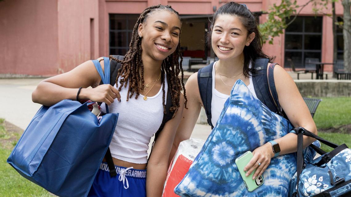 Three NJIT students on move in day