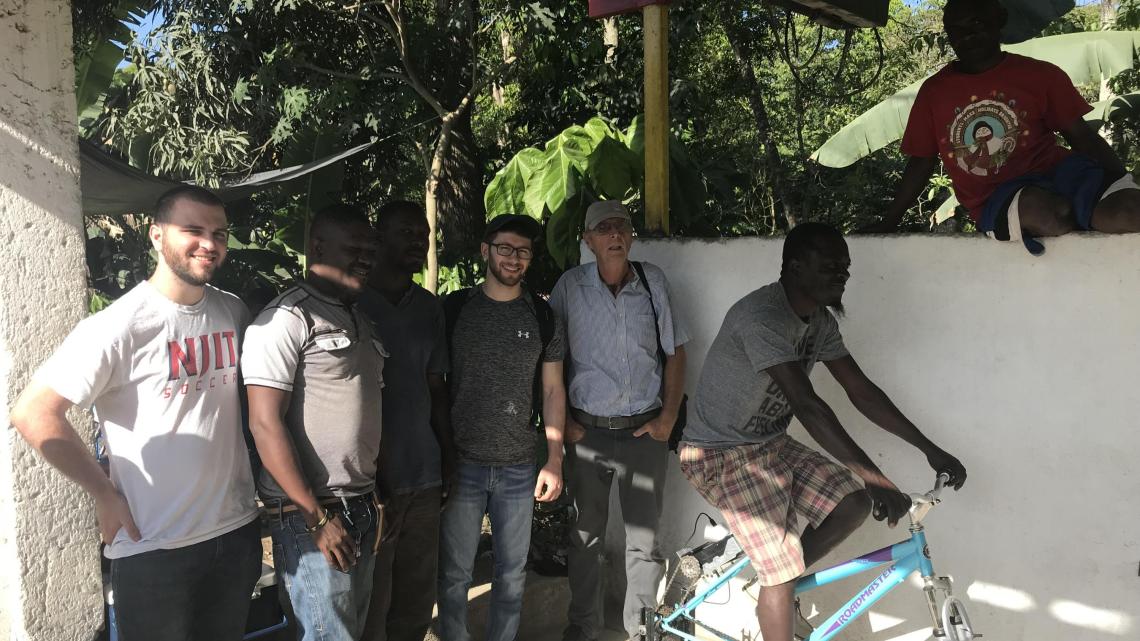 Engineering students Matt Reda and Rudolph Brazdovic, representing the New Jersey chapter of Engineers Without Borders, last year built and installed a cellphone charging station – a modified bicycle with a back wheel that turns a generator, producing 20 