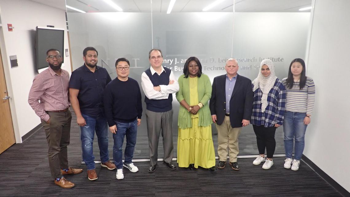 Associate Professor of Entrepreneurship Cesar Bandera (fourth from left) with Entrepreneurial Strategy students (from left) Gary White, Araviind Krishnaraj, Yujae Yi, Rita Tabe, James Colonias, Hana Sherza and Yiting Zhu