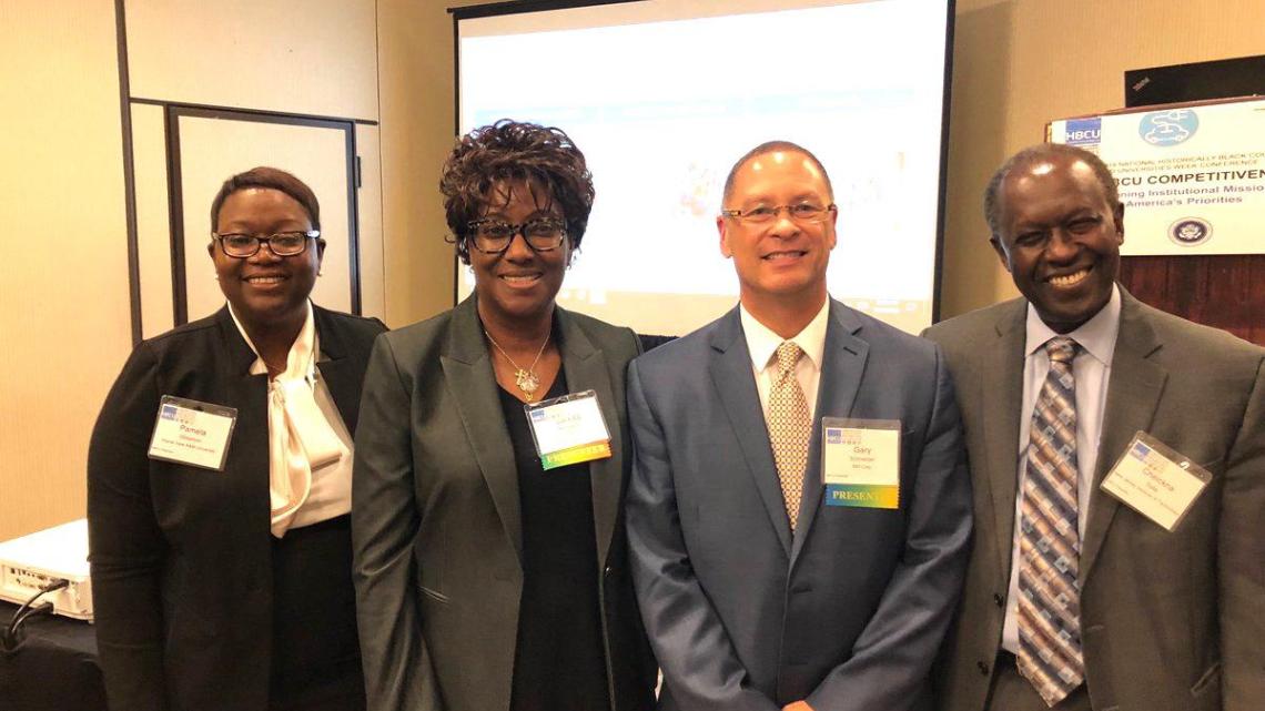 At the HBCU conference (from left) Pamela Obiomon, Prairie View A&M University; Valinda Kennedy, IBM-Midwest; Gary Schneider, IBM; Cheickna Sylla, NJIT 