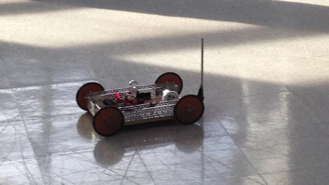 An electric vehicle travels toward its target at the 2017 event. 