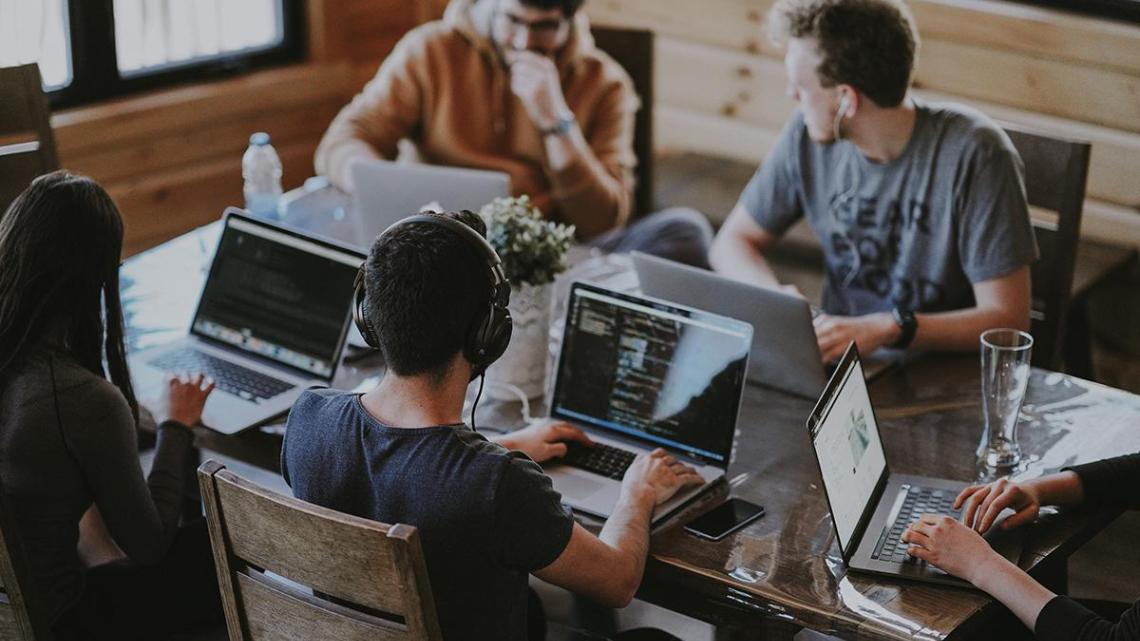 Students working together. Photo credit Annie Spratt Unsplash.