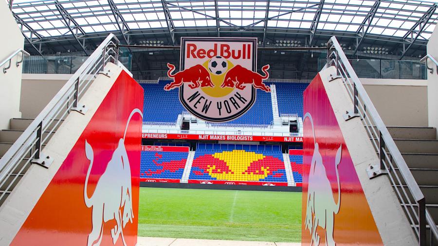 Red Bull Arena Entrance with "NJIT Makes Biologists" on the Ribbon LED Screen in Background