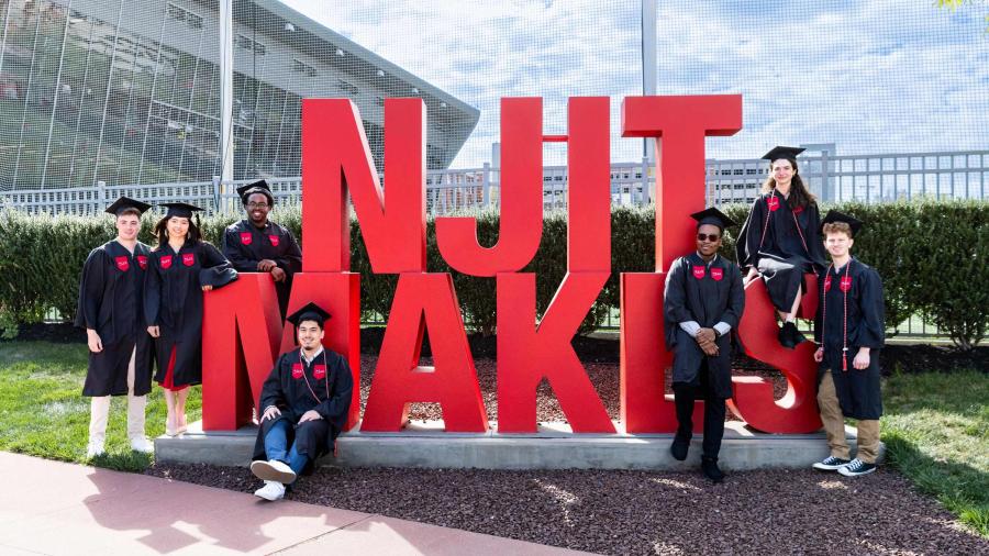 Students with NJIT Makes sign