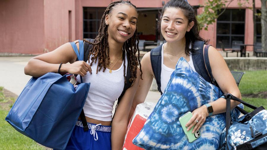 Three NJIT students on move in day
