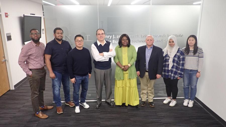 Associate Professor of Entrepreneurship Cesar Bandera (fourth from left) with Entrepreneurial Strategy students (from left) Gary White, Araviind Krishnaraj, Yujae Yi, Rita Tabe, James Colonias, Hana Sherza and Yiting Zhu