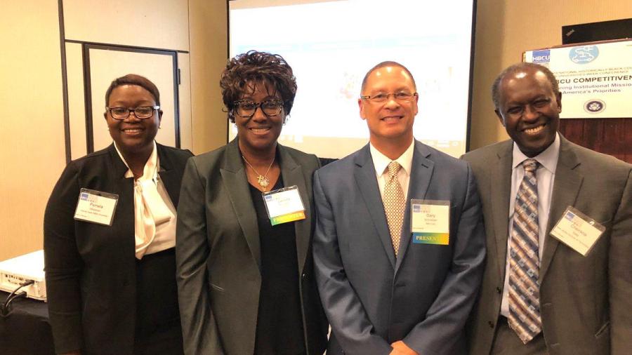 At the HBCU conference (from left) Pamela Obiomon, Prairie View A&M University; Valinda Kennedy, IBM-Midwest; Gary Schneider, IBM; Cheickna Sylla, NJIT 