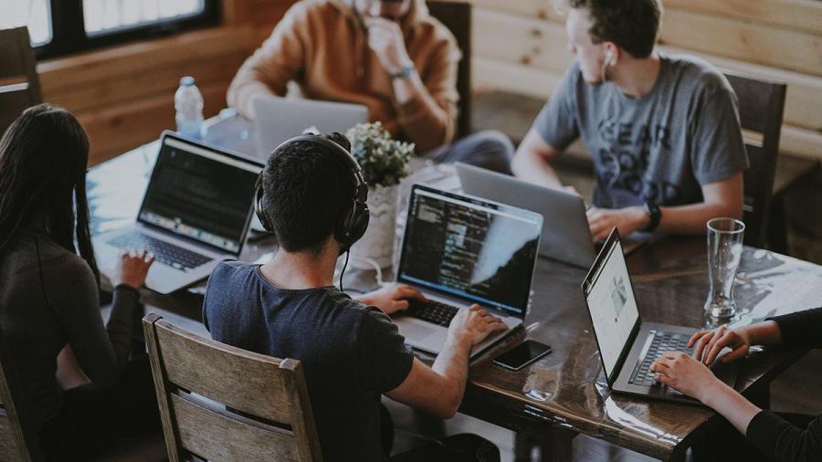 Students working together. Photo credit Annie Spratt Unsplash.