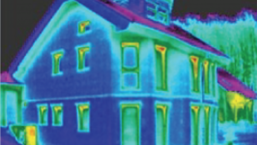 Infrared (IR) image of well insulated house showing minor leakage of heat near the tops of windows. 