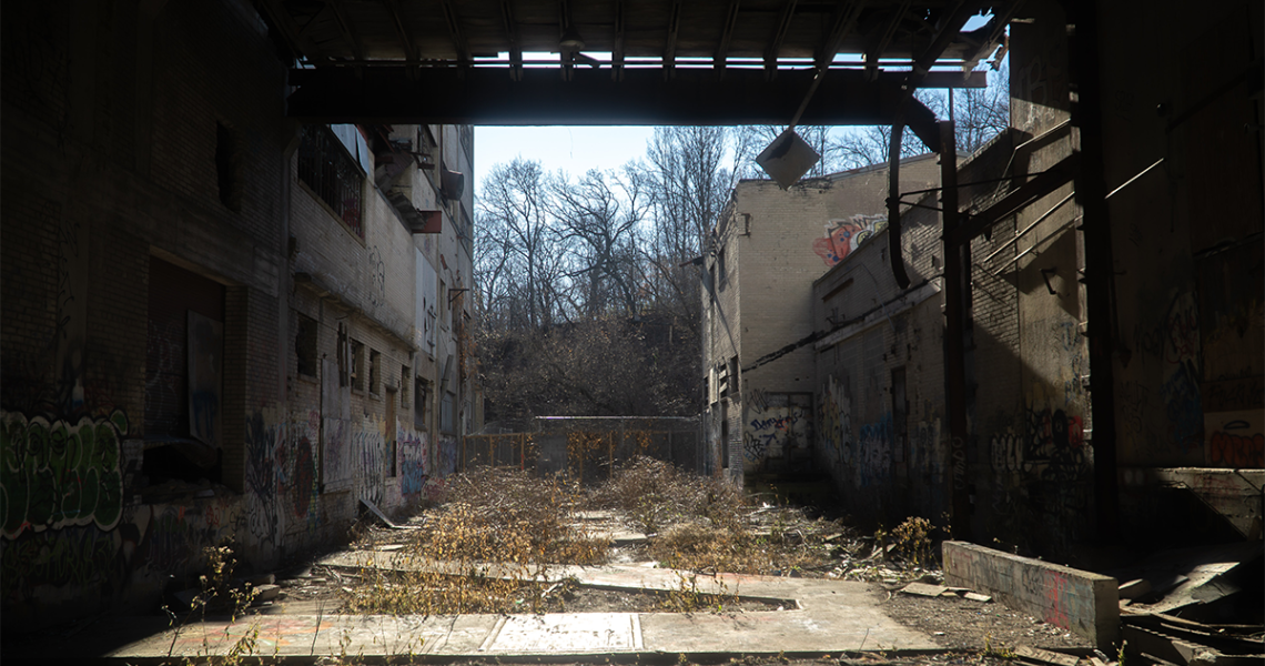 Abandoned industrial site. Photo credit Collin Burman Unsplash.