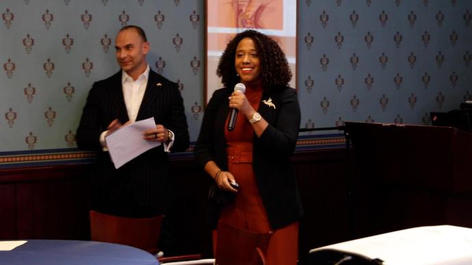 Cortes (left) and Ogando (right) addressing the group at the first Café y Conexiones event.