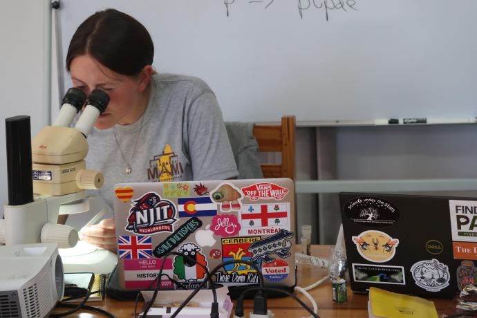NJIT Student Chloe Jelley Using Microscope