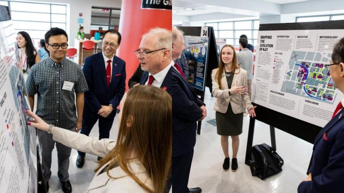 Undergraduates Erin Foody and Aaron Dimaya share their project “Mapping the Evolution of NJIT” with President Lim and Provost Pelesko.