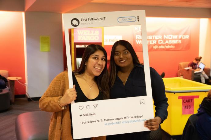 Kamela Chandrika (right) with fellow first-gen student Serita Das, a third-year business major, at a First Fellows table event in the Campus Center.