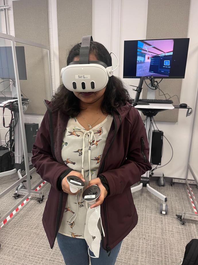 Data science graduate student Tejal Desai immersed in a Meta Quest headset