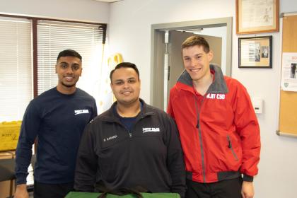 (From left) Shiva Senthilkumar, student EMT; Dhwanil Kadakia, student EMT and student captain of the First Aid and Community Service Officer Program; and Matt Rizzo, student CSO lieutenant