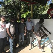 Engineering students Matt Reda and Rudolph Brazdovic, representing the New Jersey chapter of Engineers Without Borders, last year built and installed a cellphone charging station – a modified bicycle with a back wheel that turns a generator, producing 20 