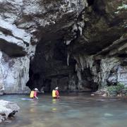 Researchers at the mouth of Brazil's São Vicente Cave system. Credit: Adriano Gambarini 