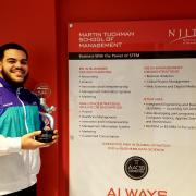 Management student Mark Quiles wins awards for his company League of Lifeguards.